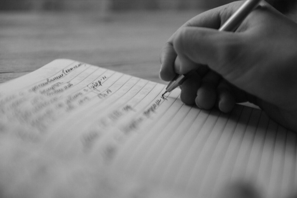 hand writing song on paper